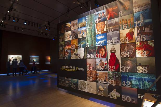 A wall lists the 50 Greatest Photographs of National Geographic, an exhibit of National Geographics most iconic photos, at the Imagine Exhibitions Gallery in the Venetian Wednesday Feb. 20, 2013.