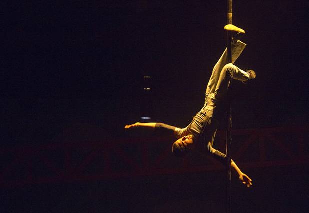 Circus Oz performer Chad Abinger hangs from a pole during a rehearsal at the Smith Center for the Performing Arts Thursday, Feb. 210, 2013. The Australian-based troupe will be performing at the Smith Center Thursday through Saturday.