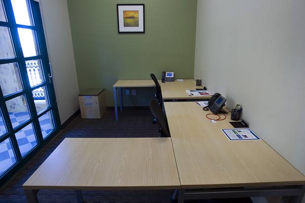An office is shown at the Tivoli Village Executive Suites Tuesday, Feb. 25, 2013.