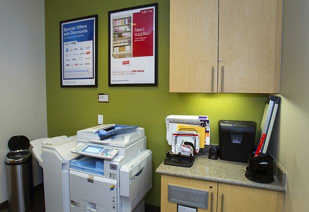 A shared copy machine and mail center is shown at the Tivoli Village Executive Suites Tuesday, Feb. 25, 2013.