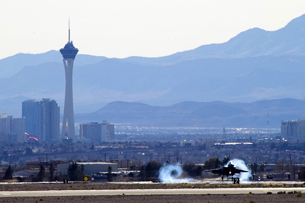 A fighter jet lands during Red Flag 13-3 exercises at Nellis Air Force Base Wednesday, Feb. 27, 2013.