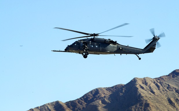 The pilot of a HH-60G Pave Hawk helicopter trains at Nellis Air Force Base Wednesday, Feb. 27, 2013.