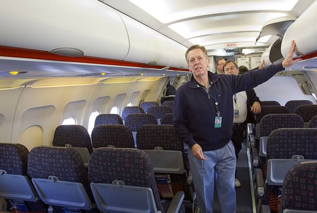 Maurice J. Gallagher Jr., chairman/CEO of Allegiant Air, walks through the company's new Airbus A319 passenger jet during an aircraft "open house" for employees at McCarran International Airport Thursday, Feb. 28, 2013. The new jet is more fuel efficient than the company's current jets.