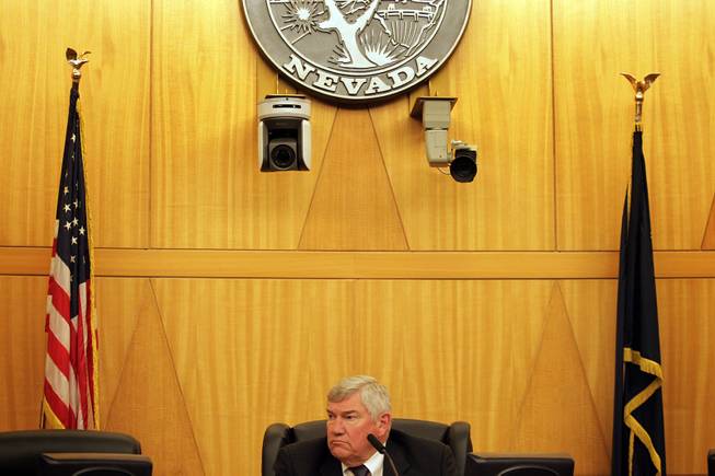 Presiding officer Stew Bell listens during the first Police Fatality Public Fact-finding Review concerning the Dec. 12, 2011 shooting of Stanley Gibson by a Metro Police officer at the Clark County Government Center in Las Vegas on Thursday, Feb. 28, 2013.