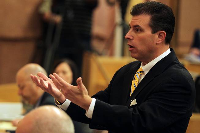 Assistant District Attorney Christopher Lalli speaks during the first Police Fatality Public Fact-finding Review concerning the Dec. 12, 2011 shooting of Stanley Gibson by a Metro Police officer at the Clark County Government Center in Las Vegas on Thursday, Feb. 28, 2013.