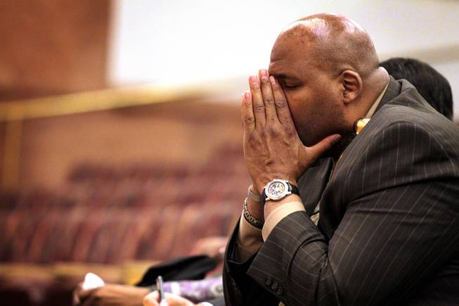 Rudy Gibson, the brother of Stanley Gibson, listens during the first Police Fatality Public Fact-finding Review concerning the Dec. 12, 2011 shooting of Stanley Gibson by a Metro Police officer at the Clark County Government Center in Las Vegas on Thursday, Feb. 28, 2013.