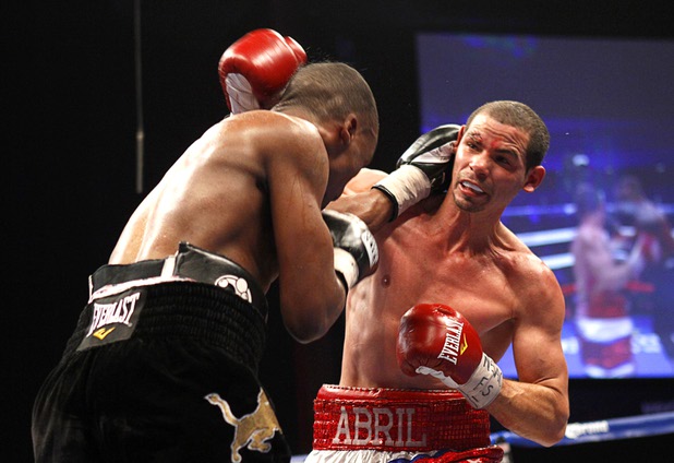 WBA lightweight champion Richard Abril, right, of Cuba battles with Sharif Bogere of Uganda during their title fight at the Hard Rock Hotel in Las Vegas, Nevada March 2, 2013. Abril retained his title with a unanimous decision victory.