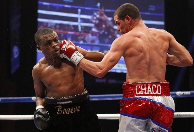 WBA lightweight champion Richard Abril, right, of Cuba connects with a punch on Sharif Bogere of Uganda during their title fight at the Hard Rock Hotel in Las Vegas, Nevada March 2, 2013. Abril retained his title with a unanimous decision victory.