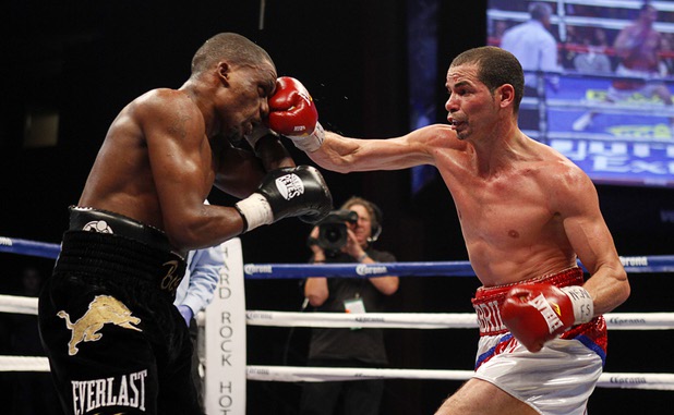 WBA lightweight champion Richard Abril, right, of Cuba connects with a punch on Sharif Bogere of Uganda during their title fight at the Hard Rock Hotel in Las Vegas, Nevada March 2, 2013. Abril retained his title with a unanimous decision victory.