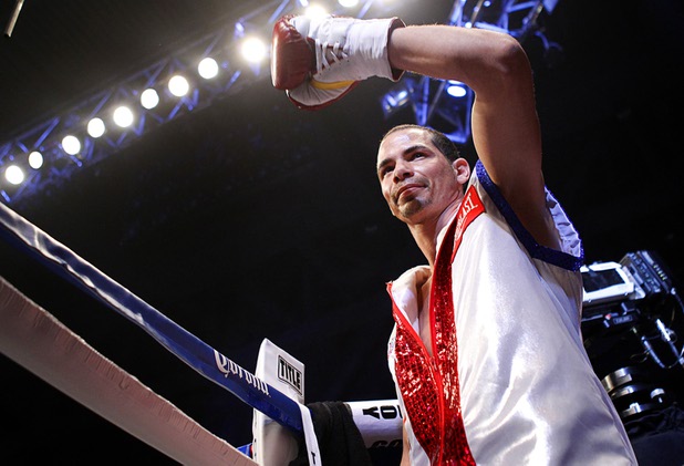 WBA lightweight champion Richard Abril of Cuba enters the ring for his title fight against Sharif Bogere of Uganda at the Hard Rock Hotel in Las Vegas, Nevada March 2, 2013. Abril retained his title with a unanimous decision victory.