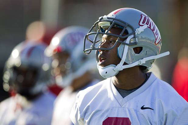 Running back Adonis Smith waits to run a drill during practice at Rebel Park at UNLV Monday, March 4, 2013.