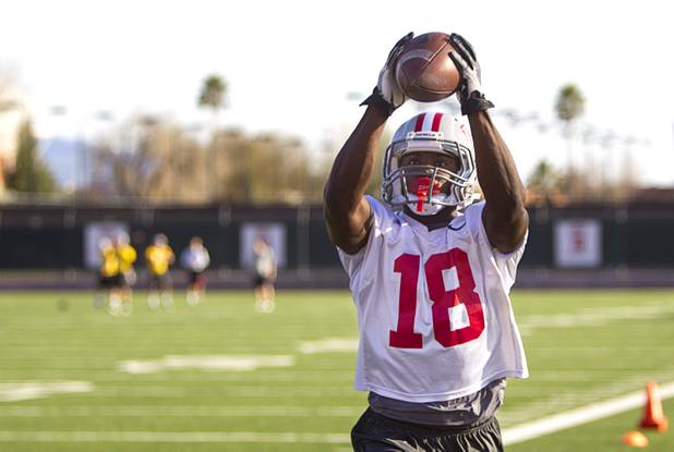 Wide receiver Marcus Sullivan catches a pass during practice at Rebel Park at UNLV Monday, March 4, 2013.