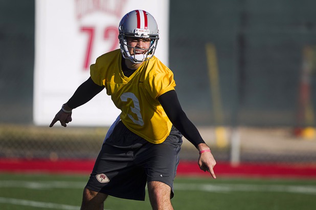 Quarterback Nick Sherry calls out to teammates during practice at Rebel Park at UNLV Monday, March 4, 2013.