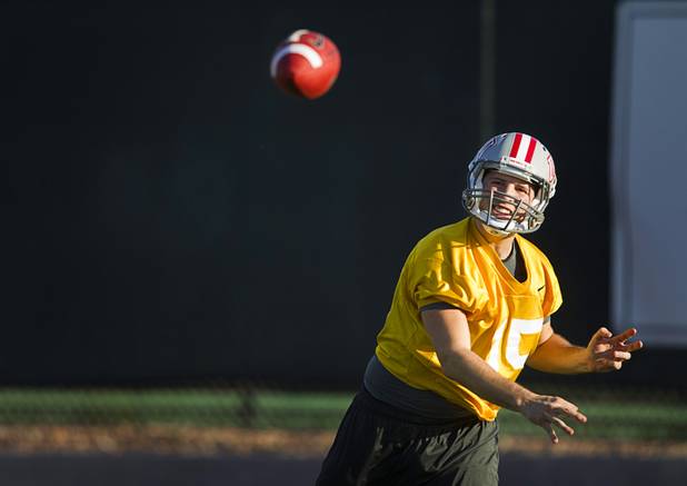 Quarterback Joe Portaro passes during practice at Rebel Park at UNLV Monday, March 4, 2013.