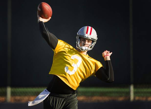 Quarterback Nick Sherry passes during practice at Rebel Park at UNLV Monday, March 4, 2013.