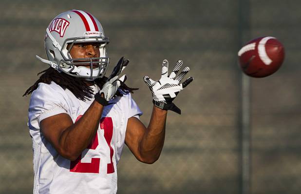 Wide receiver Taylor Spencer catches a pass during practice at Rebel Park at UNLV Monday, March 4, 2013.