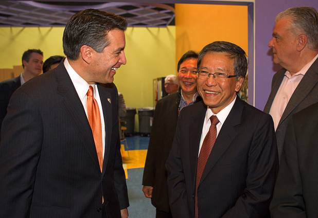 Nevada Governor Brian Sandoval, left, chats with KT Lim, chairman/CEO of the Genting Group, before a news conference at Steelman Design Monday, March 4, 2013. The Genting Group announced plans for Resorts World Las Vegas, a multi-billion dollar resort to be built on the site of the stalled Echelon project.