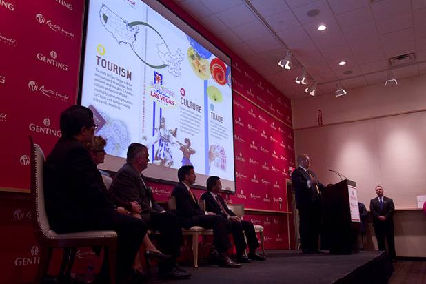 Paul Steelman, right, of Steelman Design speaks during a news conference at Steelman Design Monday, March 4, 2013. The Genting Group announced plans for Resorts World Las Vegas, a multi-billion dollar resort project to be built on the site of the stalled Echelon project.
