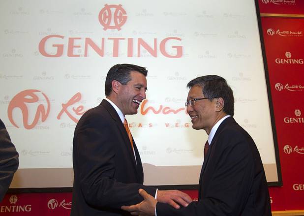 Nevada Governor Brian Sandoval, left, chats with KT Lim, chairman/ CEO of the Genting Group, at the conclusion of  a news conference at Steelman Design Monday, March 4, 2013. The Genting Group announced plans for Resorts World Las Vegas, a multi-billion dollar resort to be built on the site of the stalled Echelon project.