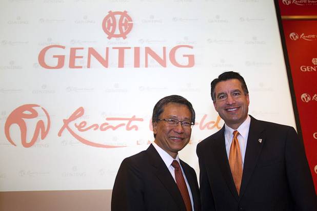 Nevada Governor Brian Sandoval, left, poses with KT Lim, chairman/ CEO of the Genting Group, at the conclusion of  a news conference at Steelman Design Monday, March 4, 2013. The Genting Group announced plans for Resorts World Las Vegas, a multi-billion dollar resort project to be built on the site of the stalled Echelon project.