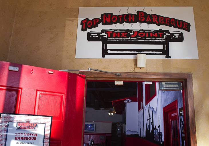 The entrance to Top Notch Barbeque at Serene and Eastern avenues Tuesday, March 5, 2013. The restaurant is the same building but is separate from the Doc Holliday's tavern.