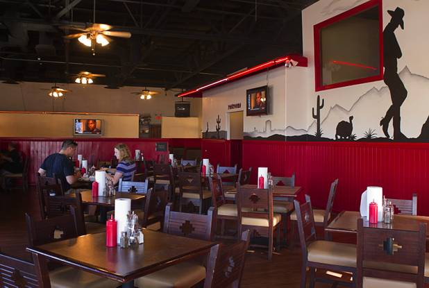 The dining area at Top Notch Barbeque at Serene and Eastern avenues Tuesday, March 5, 2013. The restaurant is the same building but is separate from the Doc Holliday's tavern.