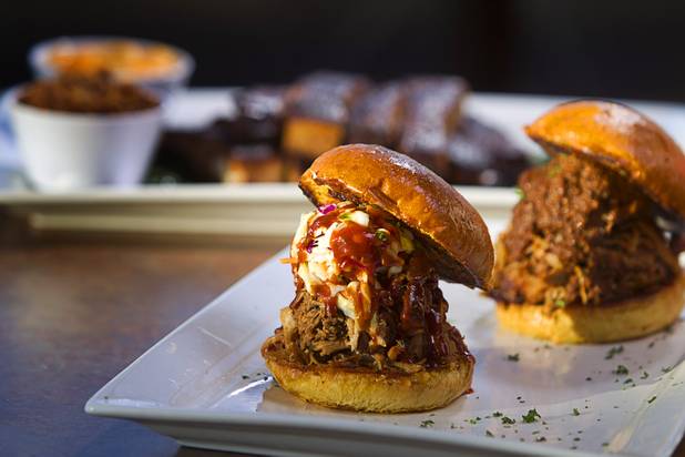 Top Notch Barbeque's Pulled Pork Sandwich with Chili and Coleslaw at Serene and Eastern avenues Tuesday, March 5, 2013. The restaurant is the same building but is separate from the Doc Holliday's tavern.