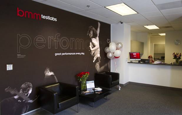 A lobby mural reflects the company's rock 'n roll theme during the opening of the BMM Testlabs new world headquarters in Las Vegas Thursday, March 7, 2013. BMM employs more than 200 people in 12 countries and operates 11 gaming labs, serving more than 400 gaming jurisdictions.