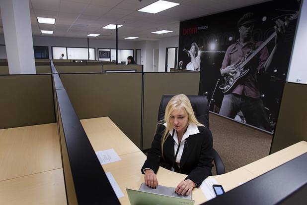 Wendy Anderson, BMM vice president of group marketing, works in an office space during the opening of the BMM Testlabs new world headquarters in Las Vegas Thursday, March 7, 2013. BMM employs more than 200 people in 12 countries and operates 11 gaming labs, serving more than 400 gaming jurisdictions.