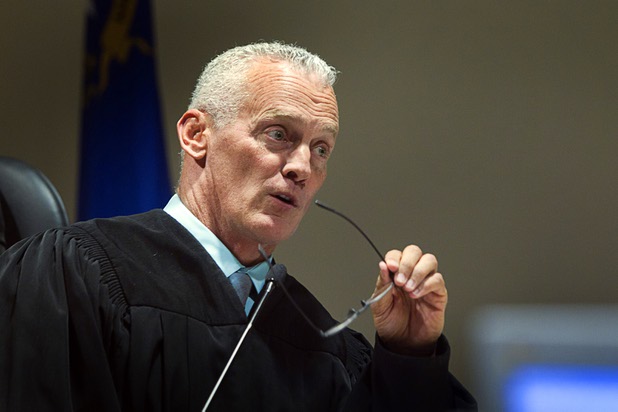Judge Mark Stevens, a Marine Corp. veteran, asks a question as World War II veterans are honored during Veterans Court in Henderson Thursday, March 7, 2013.
