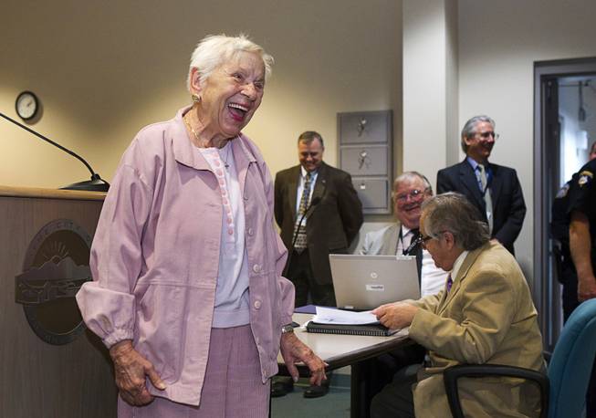 World War II veteran Evie Hallas laughs as she and two other World War II veterans are honored during Veterans Court in Henderson Thursday, March 7, 2013. Hallas served in the Navy from 1943-1945.