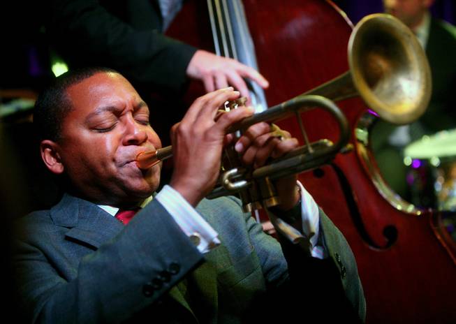 In this Oct. 24, 2007, file photo, musician Wynton Marsalis performs during the 2007 Future Legends Awards at Cooper-Hewitt National Design Museum in New York. 