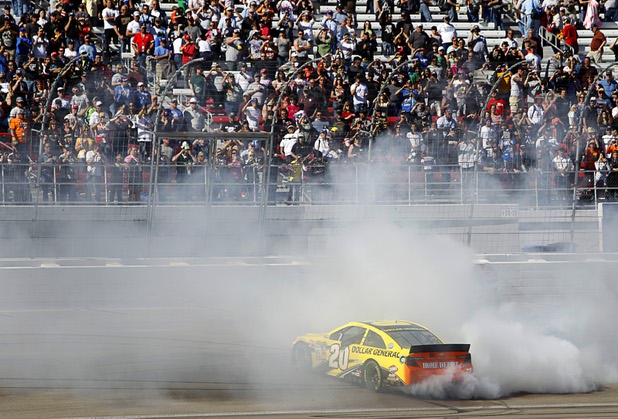 Matt Kenseth burns out after winning the Kobalt Tools 400 at the Las Vegas Motor Speedway Sunday, March 10, 2013.