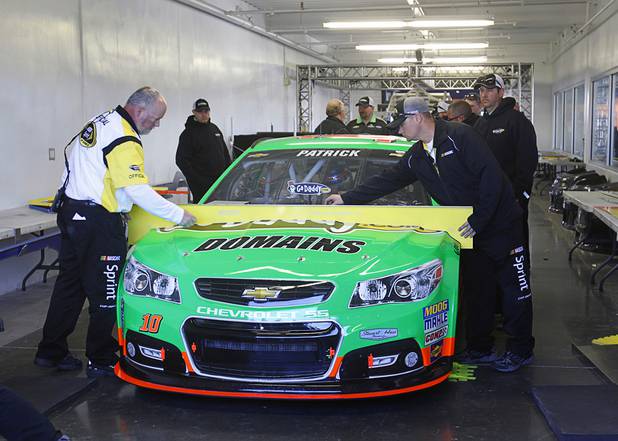 Danica Patrick's cargoes through inspection prior to the Kobalt Tools 400 NASCAR race at the Las Vegas Motor Speedway Sunday, March 10, 2013.