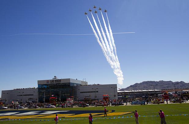 The Thunderbirds, the U.S. Air Force Air Demonstration Squadron, fly over the Las Vegas Motor Speedway prior to the start of the during the Kobalt Tools 400 NASCAR race Sunday, March 10, 2013.