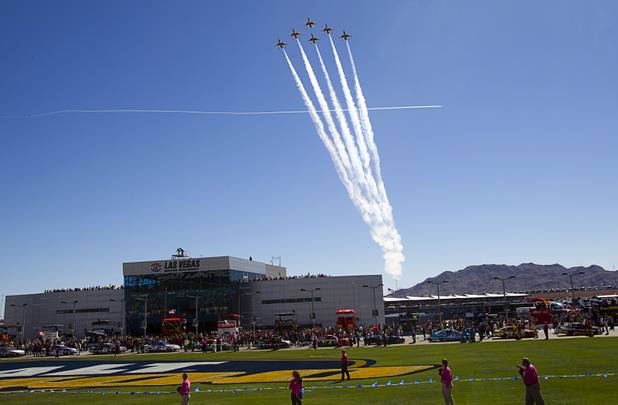 The Thunderbirds, the U.S. Air Force Air Demonstration Squadron, flies over the Las Vegas Motor Speedway prior to the start of the during the Kobalt Tools 400 NASCAR race Sunday, March 10, 2013.