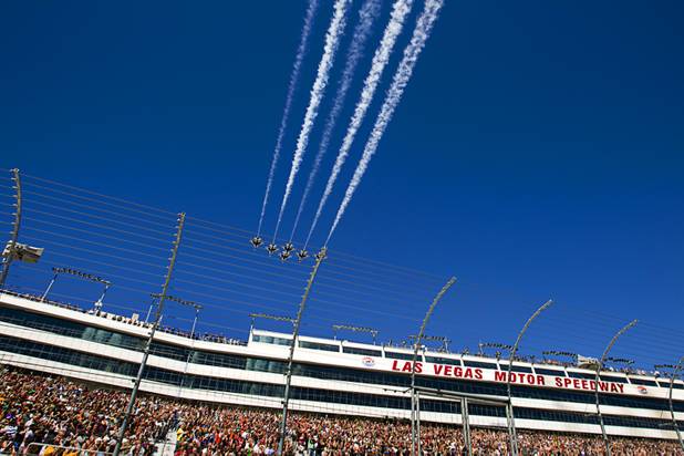 The Thunderbirds, the U.S. Air Force Air Demonstration Squadron, flies over the Las Vegas Motor Speedway prior to the start of the during the Kobalt Tools 400 NASCAR race Sunday, March 10, 2013.