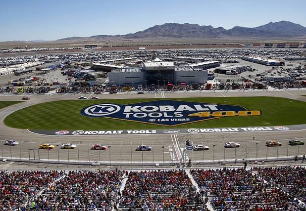 Drivers run under a caution flag during the Kobalt Tools 400 NASCAR race at the Las Vegas Motor Speedway Sunday, March 10, 2013.