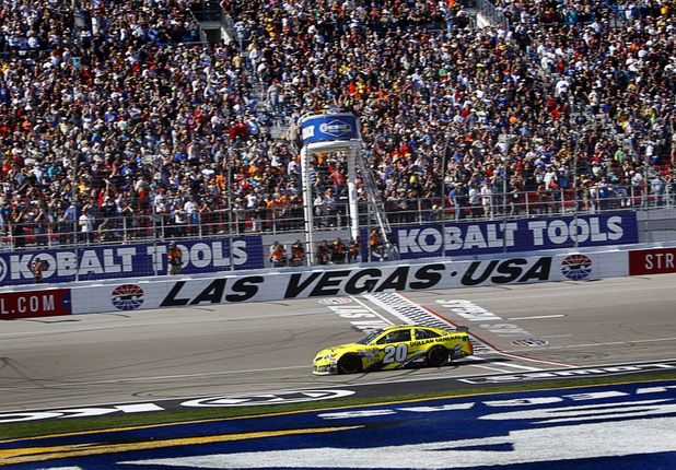 Matt Kenseth takes the checkered flag during the Kobalt Tools 400 at the Las Vegas Motor Speedway Sunday, March 10, 2013.