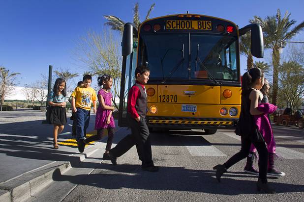 Second grader Noe Favela, center, and other students from Cahlan Elementary School, head into the Smith Center for the Performing Arts to watch a performance of "The Stinky Cheese Man and other Fairly Stupid Tales" Tuesday, March 12, 2013.  As part of the Smith Center's mission combining performing arts and education, and in partnership with the Clark County School District, the center hosted more than 1,500 elementary school students from Southern Nevada for the special performance by members of the Griffin Theater of Chicago.