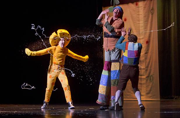 The Stinky Cheese Man (David Mitchell), left, puts his "stink" on The Giant (Matt Engle), center, and Jack (Daniel Desmarais) during "The Stinky Cheese Man and other Fairly Stupid Tales" at the Smith Center for the Performing Arts Tuesday, March 12, 2013.  As part of the Smith Center's mission combining performing arts and education, and in partnership with the Clark County School District, the center hosted more than 1,500 elementary school students from Southern Nevada for the special performance by members of the Griffin Theater of Chicago.