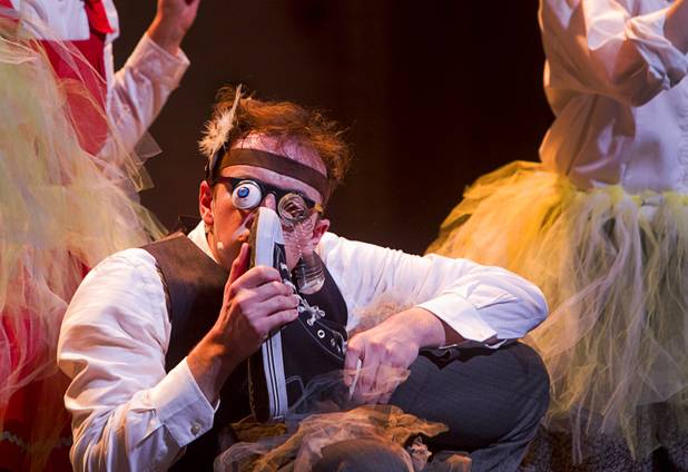 The Ugly Duckling (David Mitchell) checks for foot odor during "The Stinky Cheese Man and other Fairly Stupid Tales" at the Smith Center for the Performing Arts Tuesday, March 12, 2013.  As part of the Smith Center's mission combining performing arts and education, and in partnership with the Clark County School District, the center hosted more than 1,500 elementary school students from Southern Nevada for the special performance by members of the Griffin Theater of Chicago.