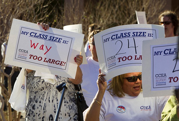 Clark County School District teachers picket outside the Sawyer State Building Wednesday, March 13, 2013. Teachers, parents and union members held the rally as legislators were meeting in a joint assembly and senate committee meeting to discuss education issues.