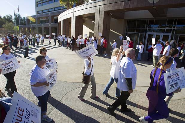 Clark County School District teachers picket for smaller class size outside the Sawyer State Building Wednesday, March 13, 2013. Teachers, parents and union members held the rally as legislators were meeting in a joint assembly and senate committee meeting to discuss education issues.