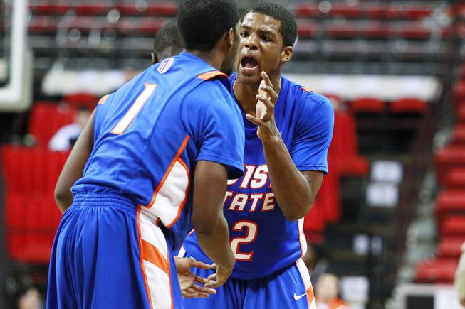 Boise State guard Derrick Marks, right, talks to teammate Mikey Thompson during their Mountain West Conference Tournament game against San Diego State Wednesday, March 13, 2013 at the Thomas & Mack Center. SDSU won the game 73-67 and will face New Mexico on Friday.