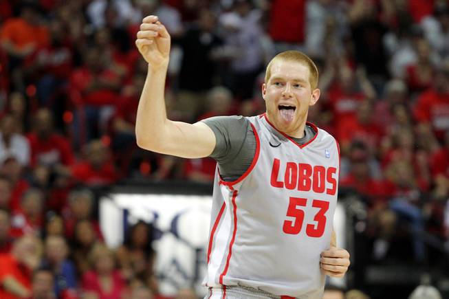New Mexico forward Alex Kirk reacts after a shot during a Mountain West Conference Tournament game against San Diego State on Friday, March 15, 2013, at the Thomas & Mack Center.