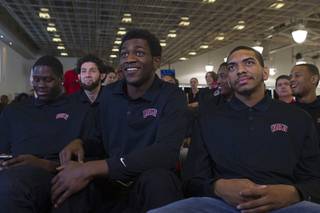 Members of the UNLV men's basketball team, from left, Anthony Bennett, Savron Goodman, and Anthony Marshall, learn their selection while watching the NCAA Tournament's Selection Show at the Mendenhall Center Sunday, March 17, 2013. UNLV will play Golden Bears in its NCAA tournament opener on Thursday at HP Pavilion in San Jose.