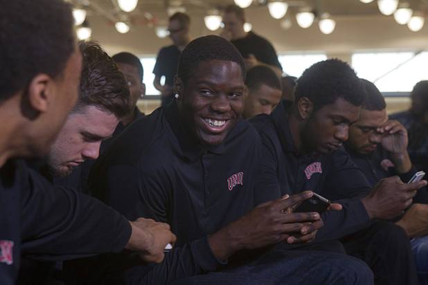 Antony Bennett, center, waits with members of the UNLV men's basketball team as they watch the NCAA Tournament's Selection Show at the Mendenhall Center Sunday, March 17, 2013. UNLV will play Golden Bears in its NCAA tournament opener on Thursday at HP Pavilion in San Jose.