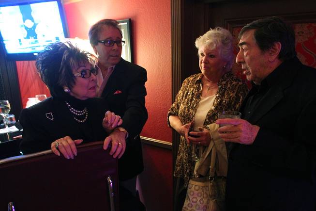 Lorraine Hunt-Bono and Dennis Bono talk with Sue and Mike DiBari at the recently remodeled Italian American Social Club Saturday, March 23, 2013.