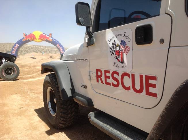 A rescue vehicle sits near the course of the Mint 400 off-road race on Saturday, March 23, 2013, near Las Vegas.